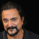 Image for article titled Tom Savini's house is filled with every nightmarish horror prop you can imagine...and two friendly cats